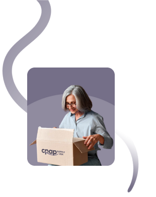 A woman excitedly opens the box containing her order from CPAP Supply USA