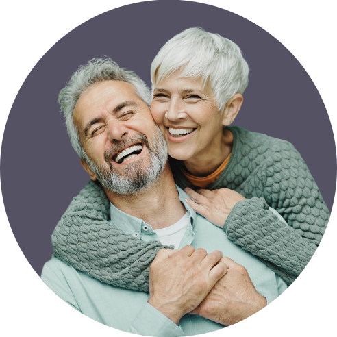 Elderly couple laughing and smiling together