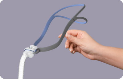 hand holding cpap mask